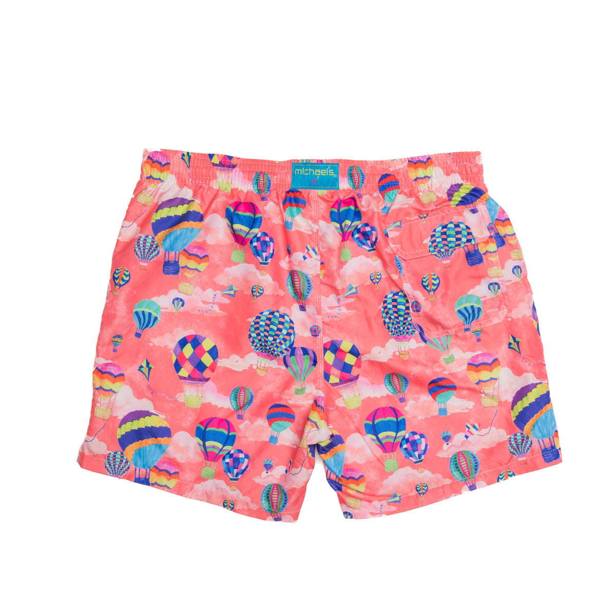 Boy&#39;s coral swim trunks with cyclist liner, hot air balloons pattern, back view