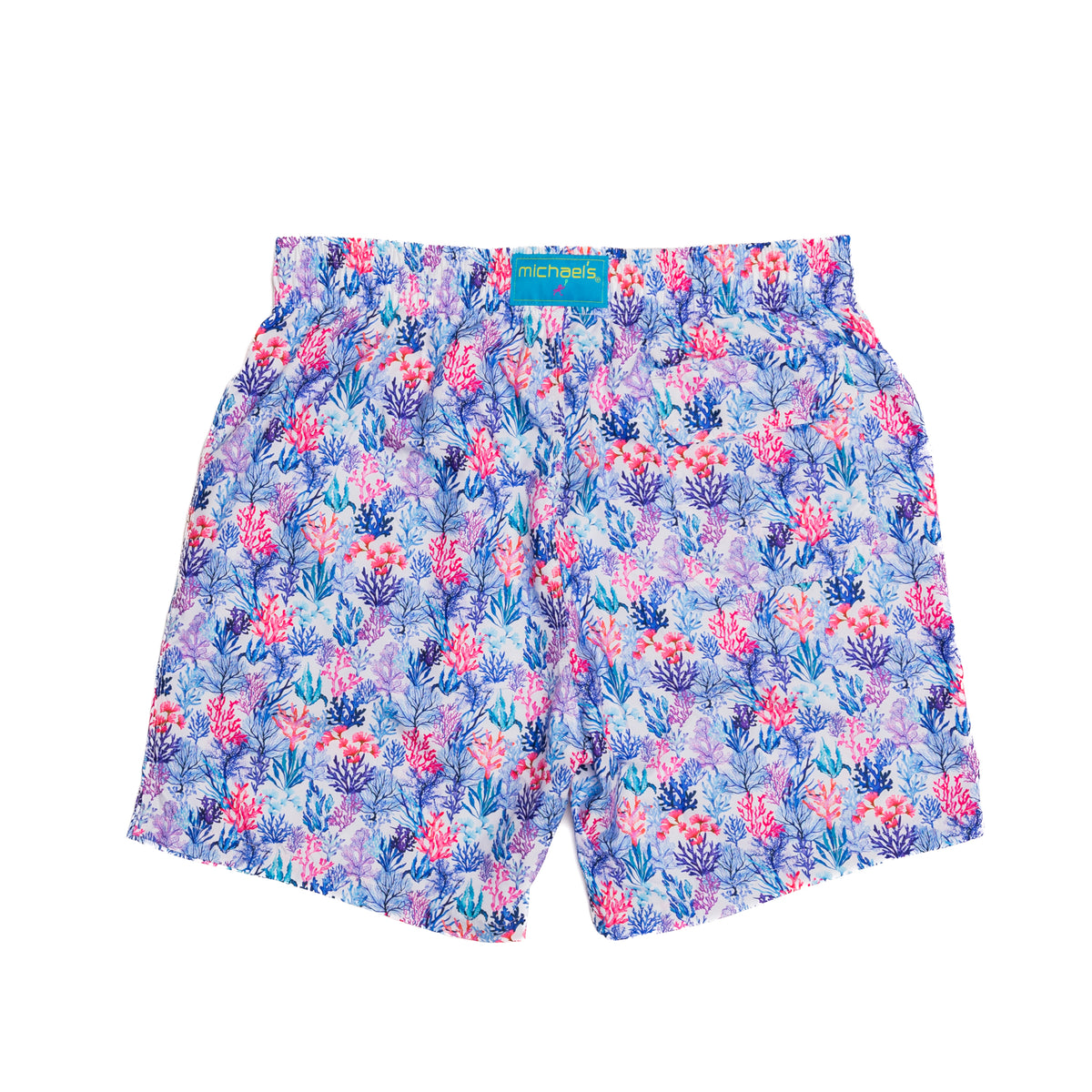Boy&#39;s white swim trunks with cyclist liner, coral jungle pattern