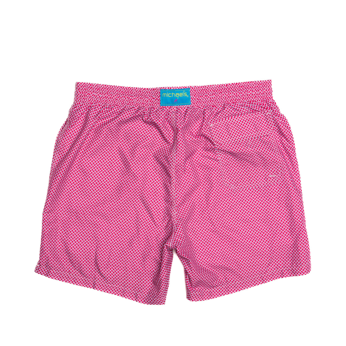 Coral/turquoise swim trunks with wave pattern for boys, back view