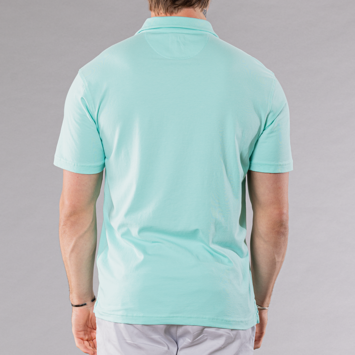 Men&#39;s aqua polo shirt made of pima cotton/stretch, back view