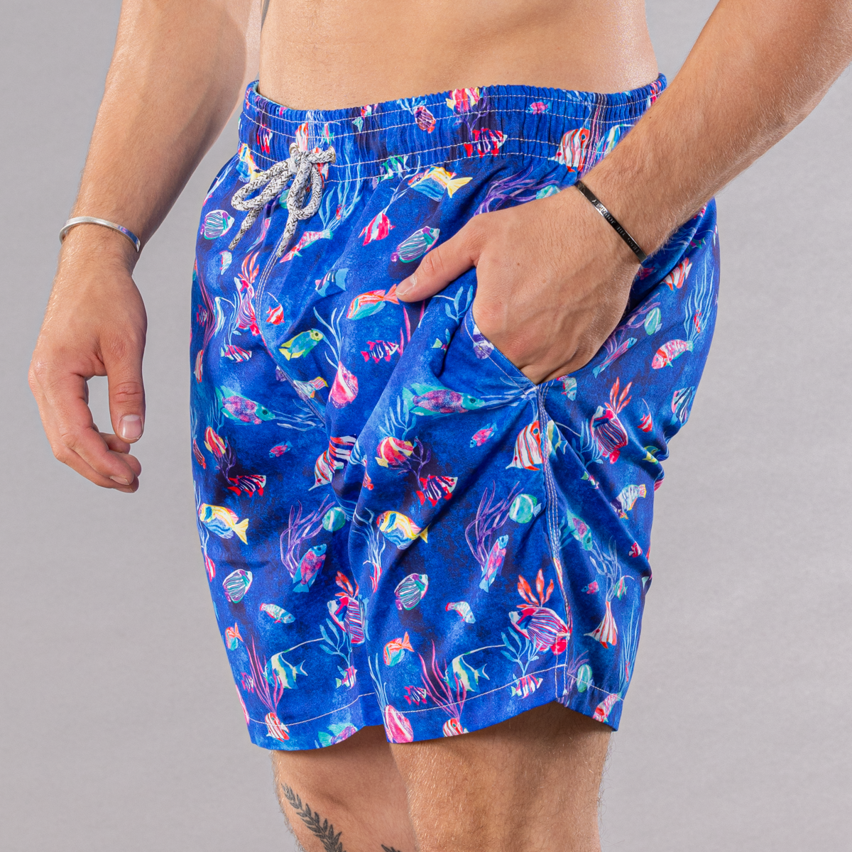 Men&#39;s blue swim trunks with cyclist liner, tropical reef pattern