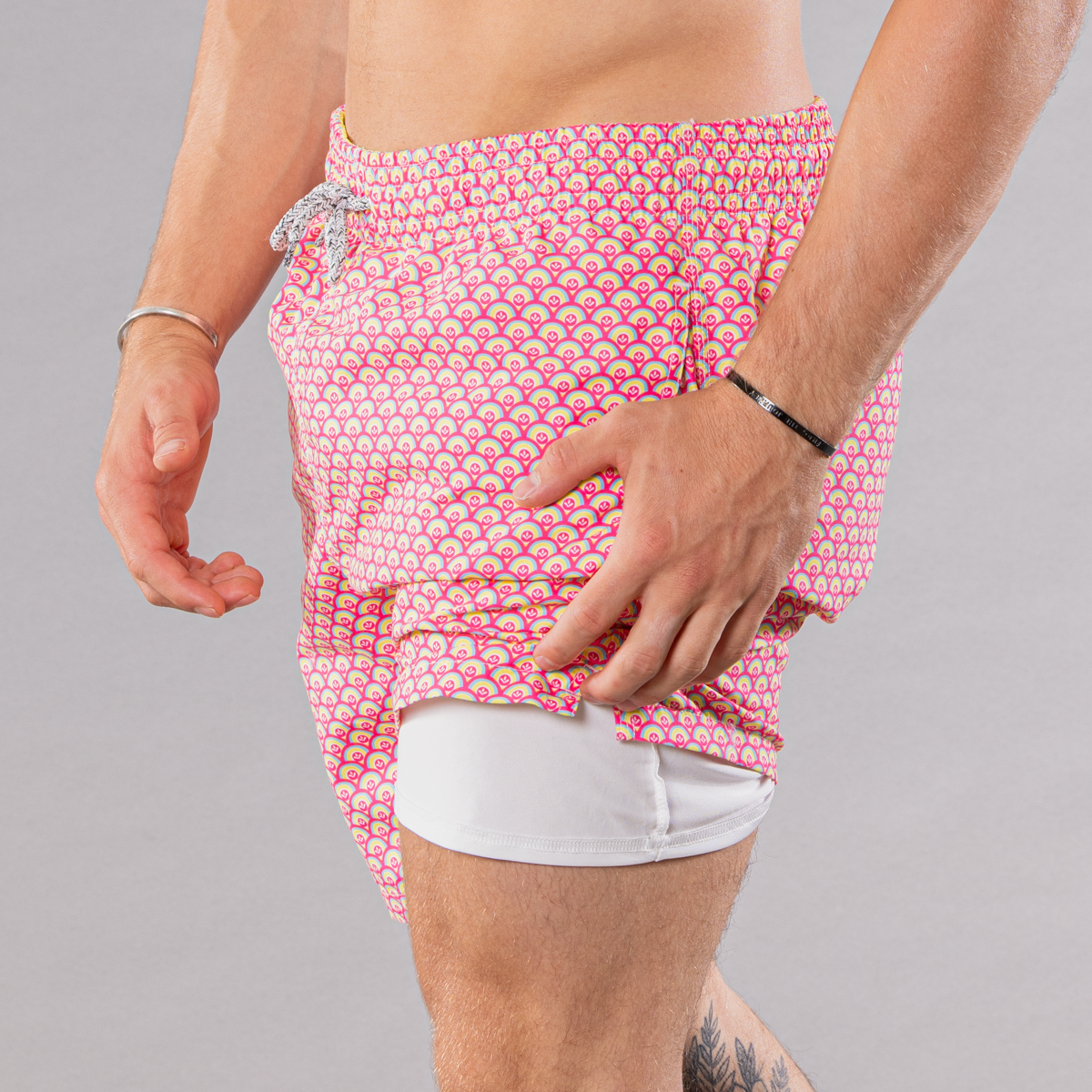 Men&#39;s coral/yellow swim trunks with cyclist liner, half moons pattern, inner layer