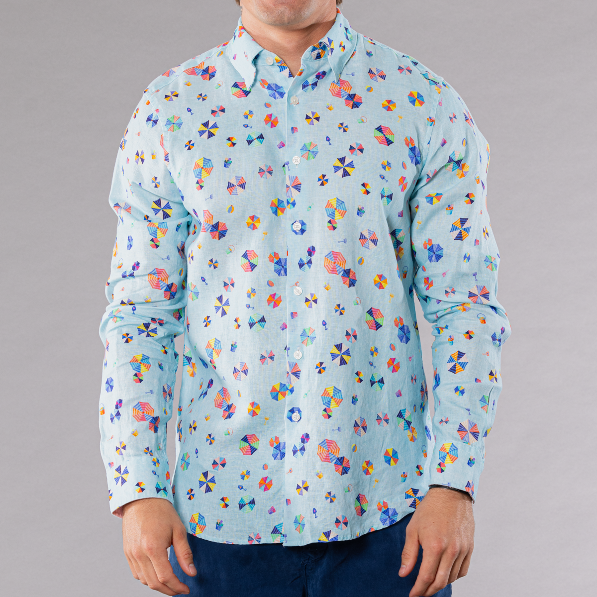 Men&#39;s light blue linen long sleeve shirt with umbrellas pattern, front view