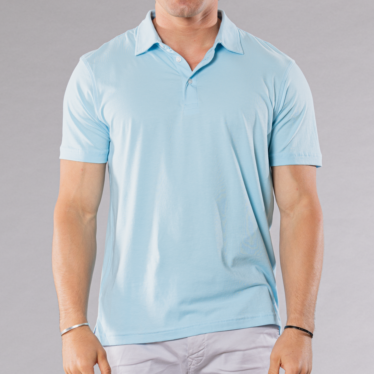 Men&#39;s light blue polo shirt made of pima cotton/stretch, front view