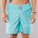 Men's solid print swim trunks in aqua, front view