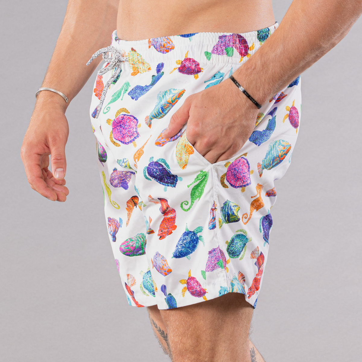 Men&#39;s white swim trunks with cyclist liner, fish chart pattern